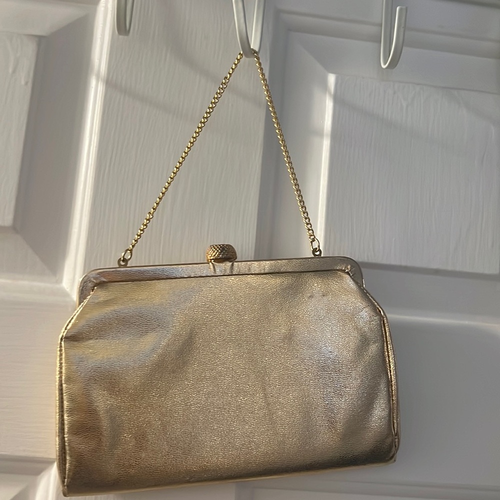 Vintage 1950s gold clutch one small spot on bag in pitcher